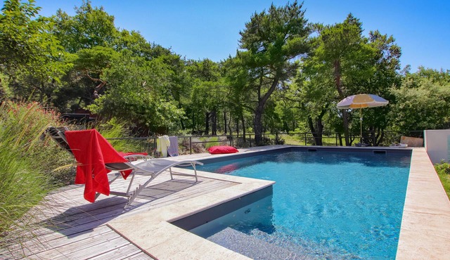 Spend a dream vacation in this delightful modern cottage style home with pool.