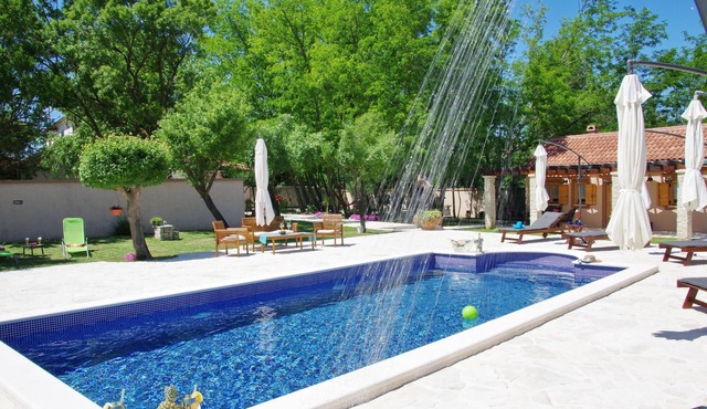 Spend an unforgettable summer vacation with your loved ones at this well-maintained property with tw