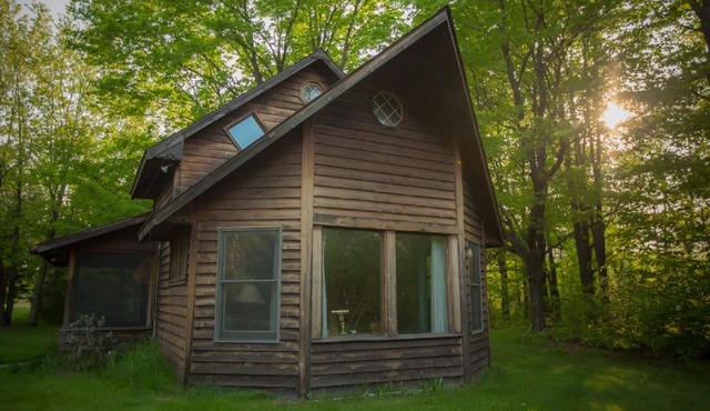 Spiral Staircase Leads To The Lofted Bedroom And Overlooks The Birch Woods.