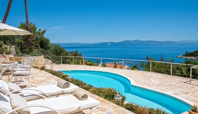 Splendid stone villa hovering above bay and sea views,with private pool