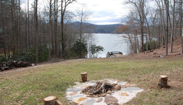 Splendor Cove Retreat…Lakefront w/dock, Huge Yard, Lake Toys, Stream w/wfall