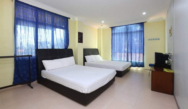 SPOT ON 89857 Azra Inn Rumah Tumpangan