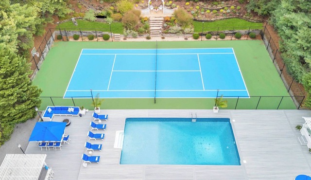 Sprawling East Quogue Retreat with Resort-Style Pool, Tennis, and.