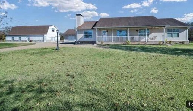 Sprawling family farmhouse in a beautiful spacious country setting.