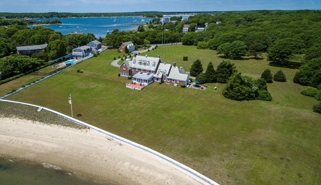 Sprawling Waterfront Classic Estate with Private Sandy Beach