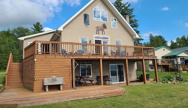 Spread out in our spacious double-lot lakefront cabin!
