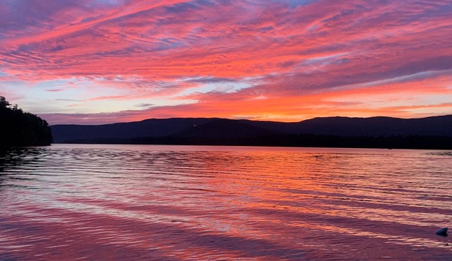 Squam Lake charming, authentic cottage with dock & tennis court
