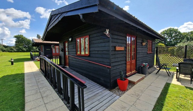 Squirrel, Bespoke holiday lodge in beautiful Suffolk conservation village