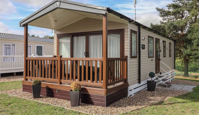 STAG LODGE, CARAVAN 70, with pool in Belton, Norfolk
