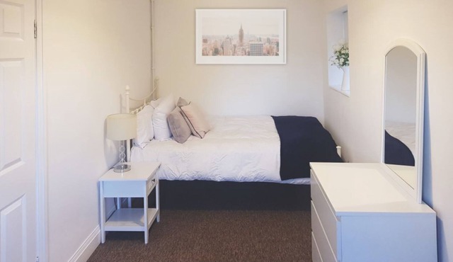 Standard double room with shared bathroom