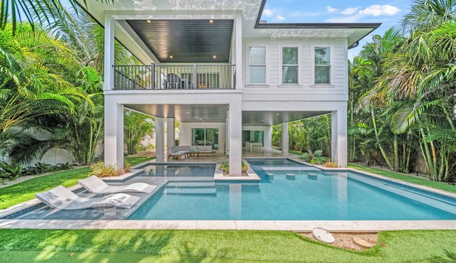 Stay at Kay's Landing on Anna Maria Island—luxury 6-bedroom home with pool, views & beaches!
