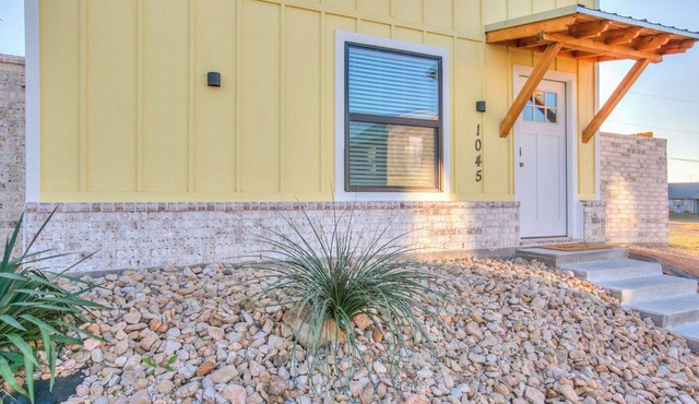 Stay at Sunrise is a golden retreat located one block from the river.