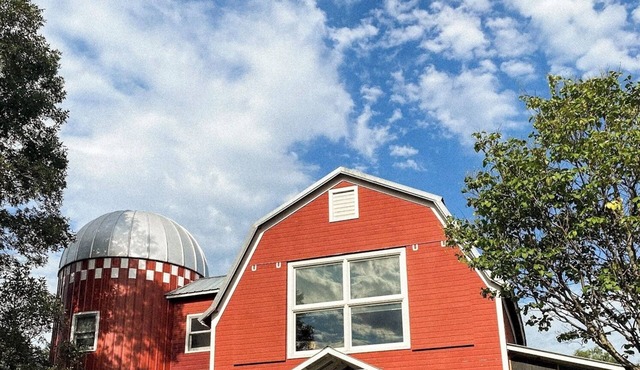 Stay in a Stunning Red Barn Filled with Antique Charm