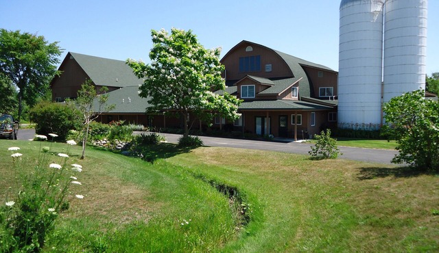 Stay in the heart of Leelanau county wine tasting region. Views to Traverse Bay