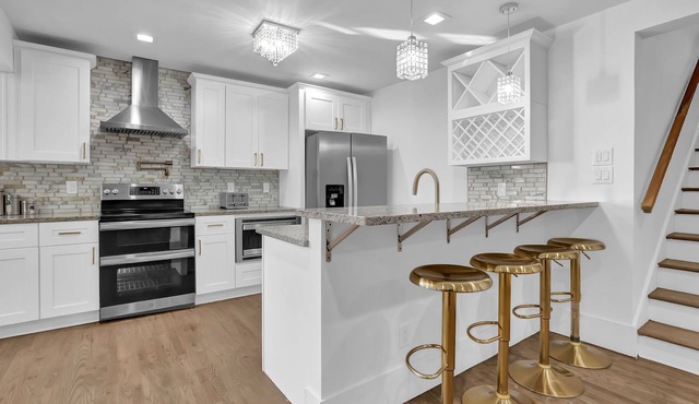 Step into a world of spacious elegance as you enter this carefully curated home