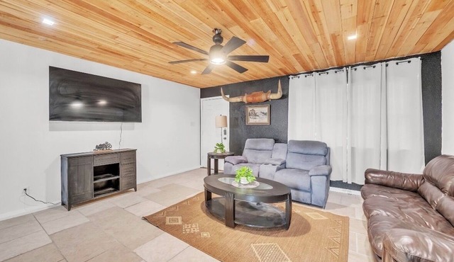 Step Into Style: Open Living, Wooden Ceilings 4BD 2BA Haven