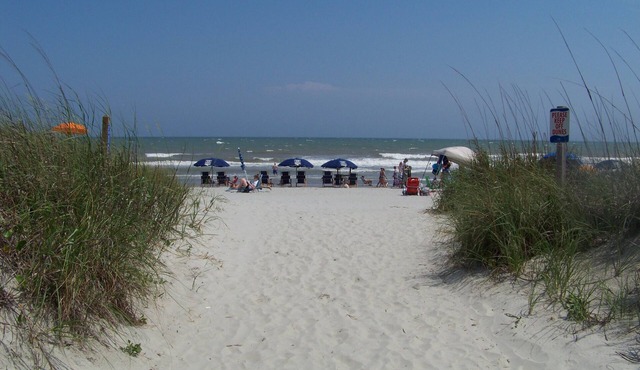 Steps away from beach. Great for families. Townhouse with 3 bedrooms & 3 baths.