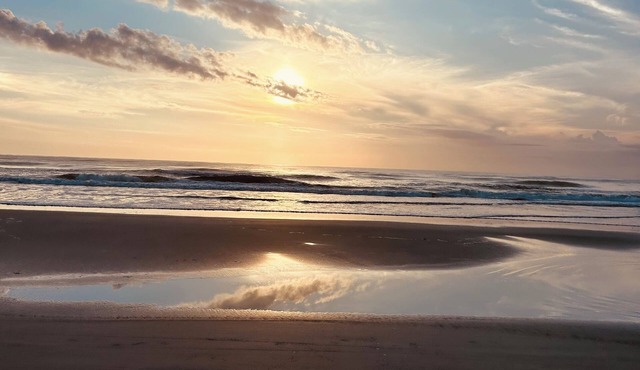 Steps from the beach. This Beach House is a comfy user friendly home.