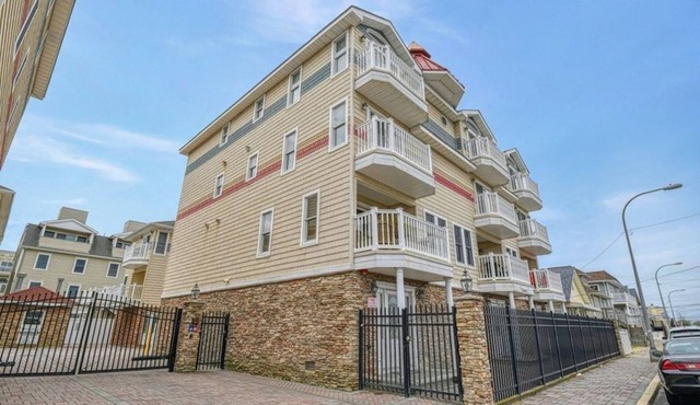 Steps from the famous Seaside Heights boardwalk beach! Family-sized townhouse.n