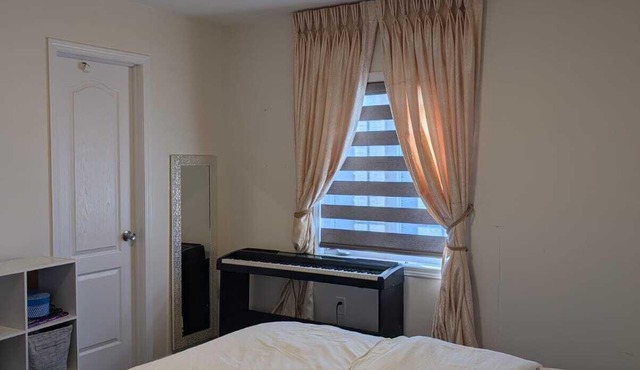 Steps to Heartland Town Centre! Cozy Home with a Huge Backyard