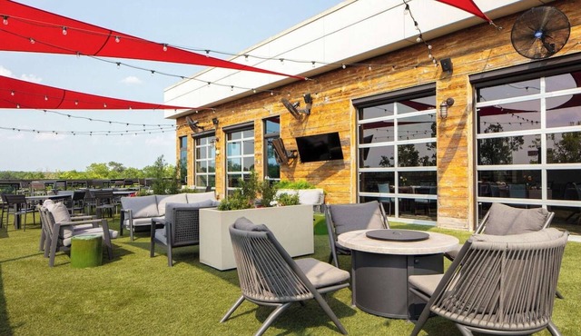 Steps to Mercedes-Benz Amphitheater + Rooftop Bar