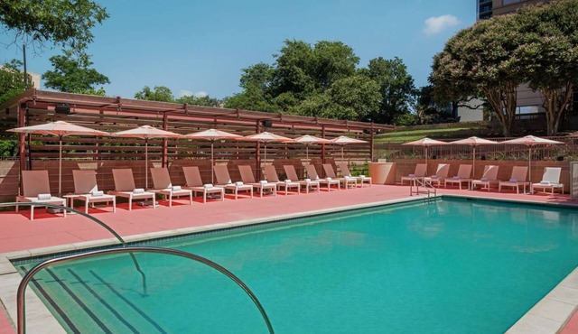 Steps to Texas Capitol + On-site Dining. Pool. Gym
