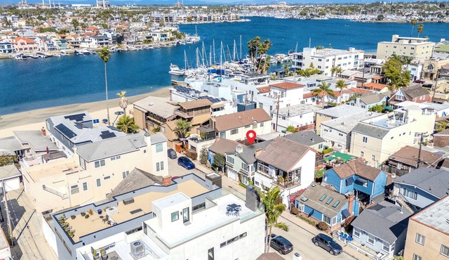 Steps to the Beach! Coastal home with two car garage