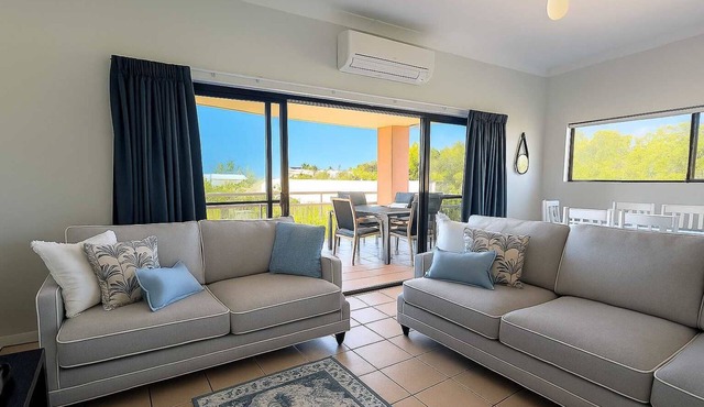 Steps to The Strand 2BR Apt with Pool, Castle Hill Views