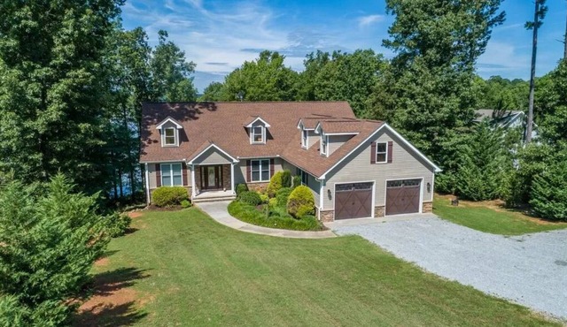 Still Waters Refuge | Main Lake Luxury w/Spectacular Sunset Views of Lake