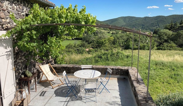 Stone barn in the middle of fields, village of Aubignas, Ardèche