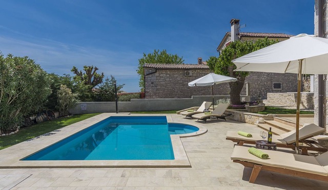 Stone holiday home with private pool and fenced garden near the water park