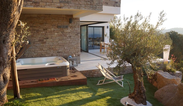 Stone house with panoramic views over the bay of Figari, outdoor spa