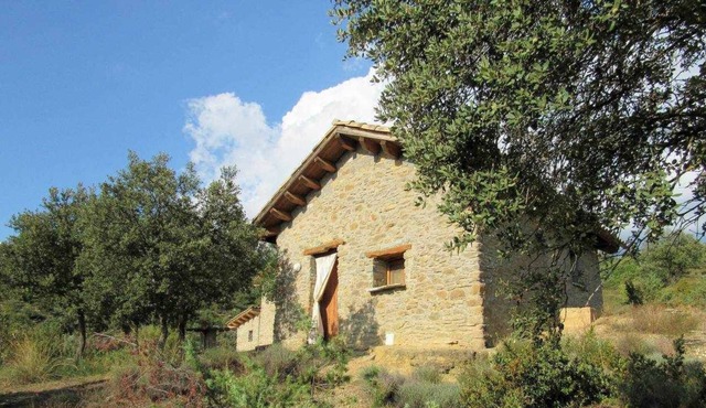 Stone house, overlooking the Congost de Mont-Rebei