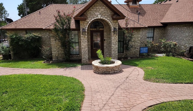 Stone House with patio and less than 50 yards to the water.