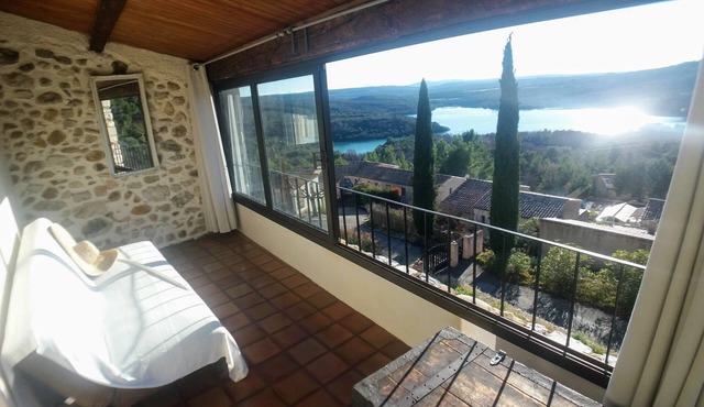 Stone house with terrace and garden facing the Lake