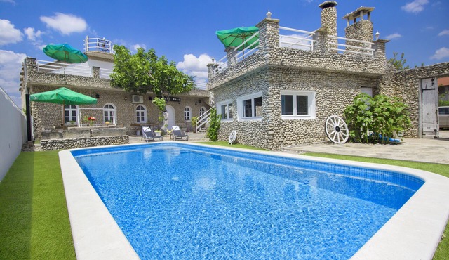 Stone Ship made of thousands tiny rocks (heated pool)