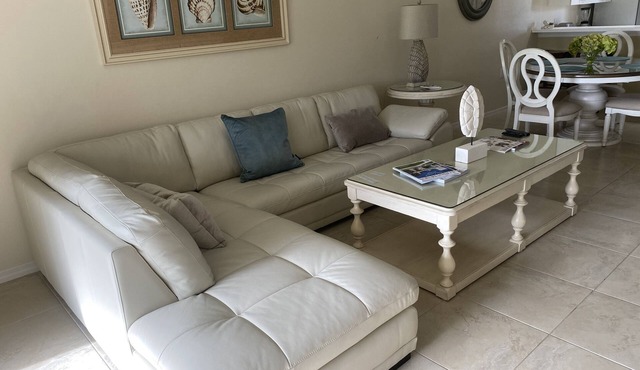Stoneybrook condo with amazing sunsets overlooking 10th hole from your lanai!