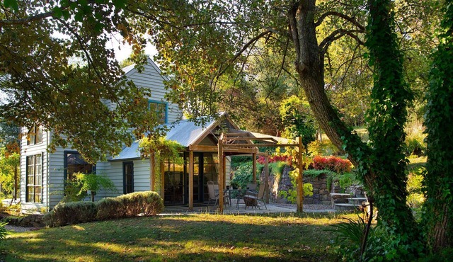 Storybook Cottage-surrounded by expansive gardens