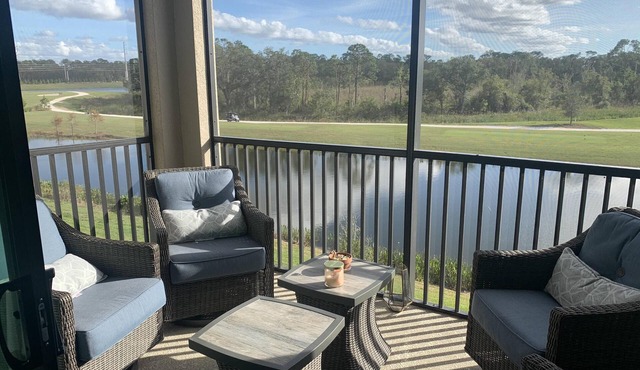 Striking 3rd floor 2/bed, 2/bath condo with golf & lake view