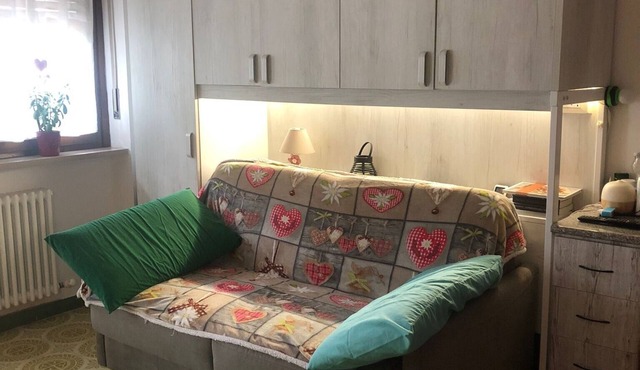 Studio Apartment 'L'oasi Dei Larici' with Shared Garden and Balcony in Bagnolo Piemonte