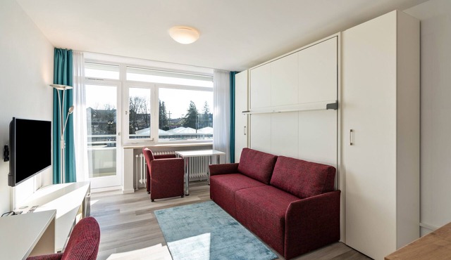 Studio Apartment "Huber Living Basic 210" with Balcony & Wi-Fi in Germering