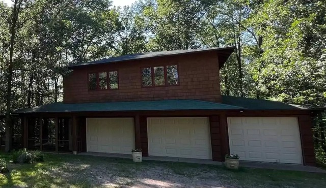 Studio apartment over cabin garage woods lake view