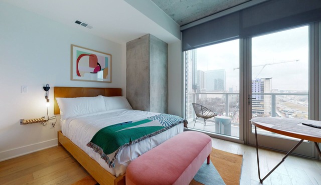 Studio condo with rooftop pool, fast WiFi, central AC & private W/D