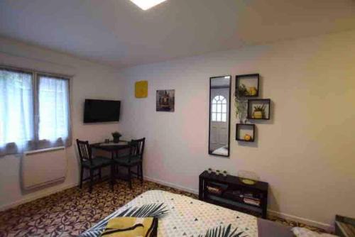 Studio dans maison individuelle