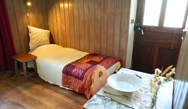 Studio equipped with simple bed