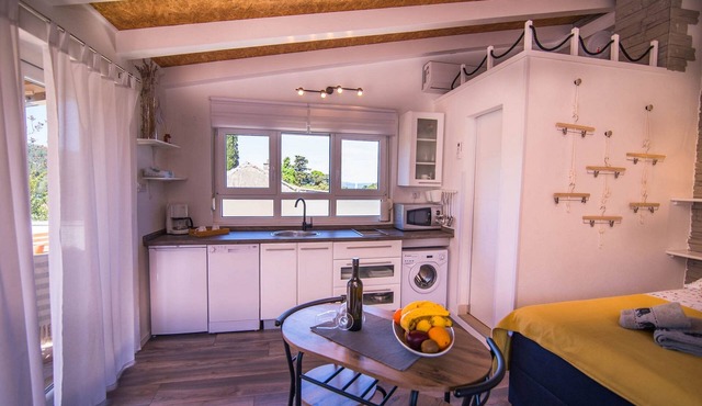 Studio flat with terrace and sea view Veli Lošinj, Lošinj (AS-21260-a)