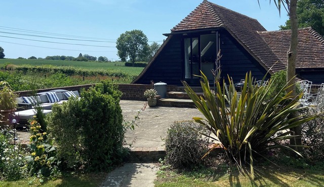 Studio in mature English gardens in an area of outstanding natural beauty