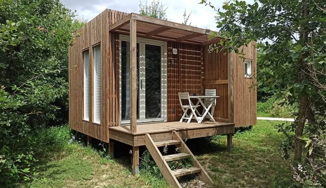 Studio in quiet garden with trees