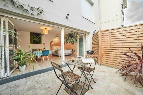 Studio LILAS avec terrasse au calme