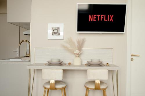 Studio meublé L'écrin doré avec Netflix